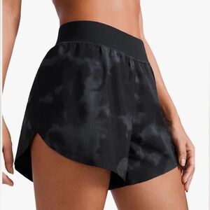 Black Tie Dye CRZ YOGA Mid Waisted Dolphin Athletic Shorts for Women 4"
